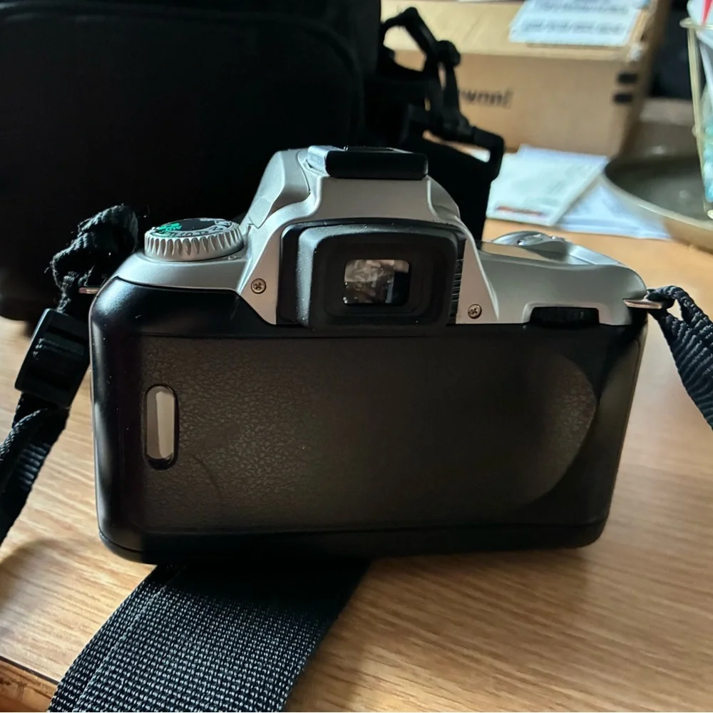Nikon Gray Camera with Canon Lens and Lowepro Camera Case